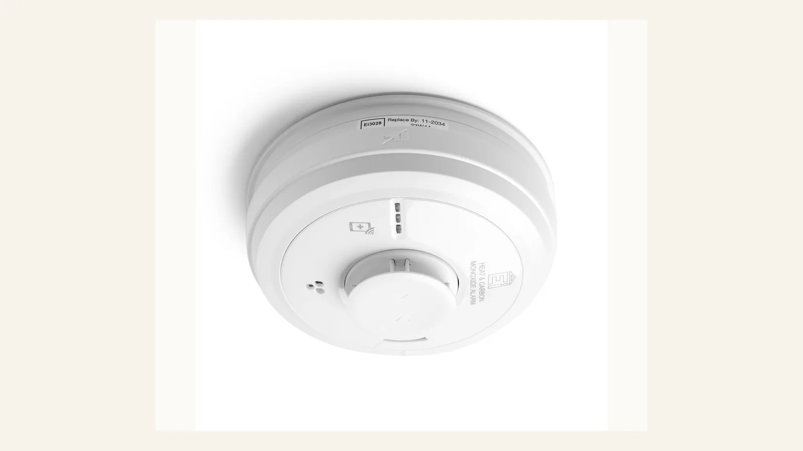Ceiling-mounted smoke and heat alarm in a London flat